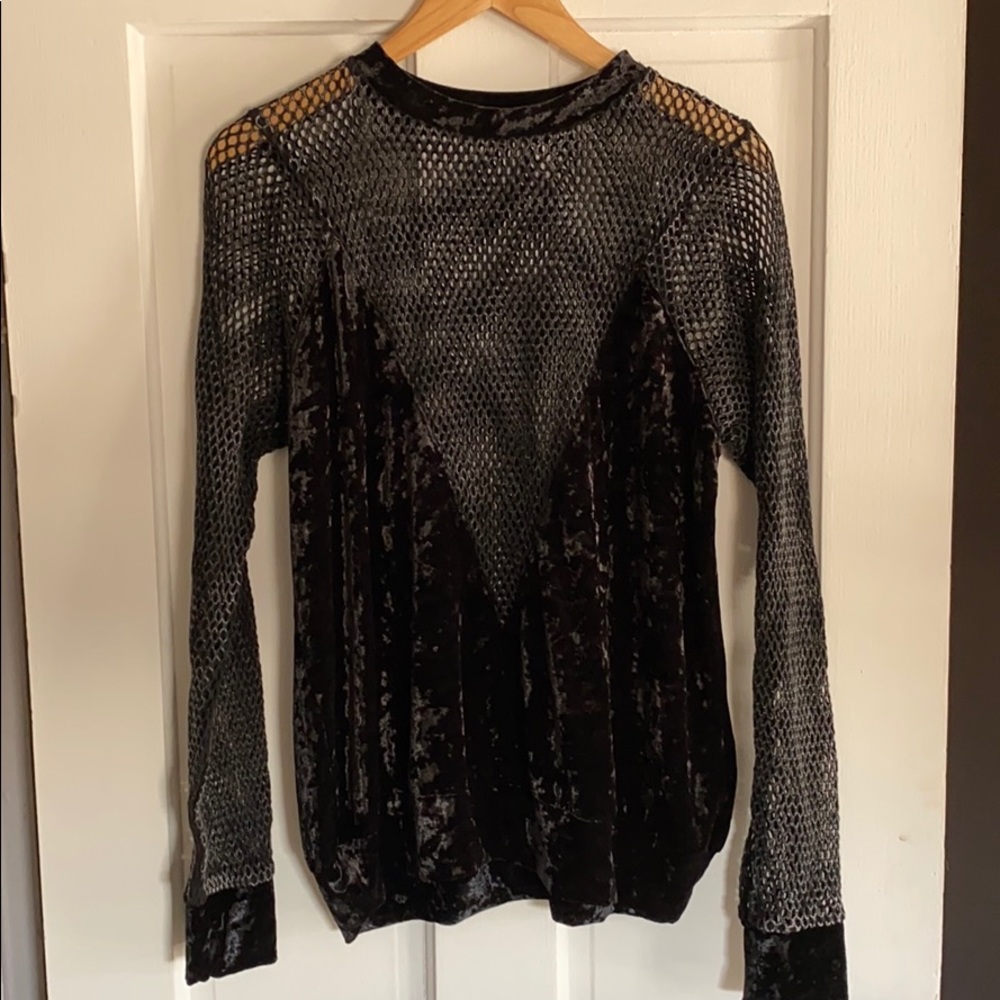 Velvet top with crochet detail.